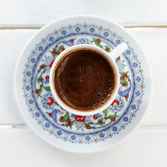 Top view of Turkish Coffee Cup on a decorative saucer